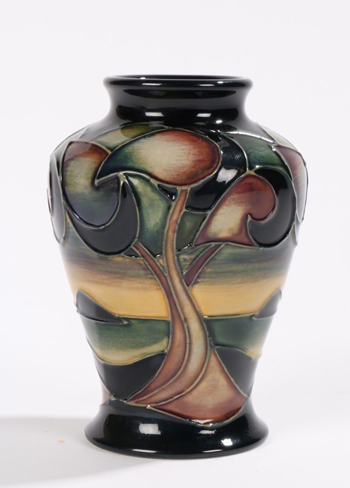 Moorcroft Western Isles pattern vase, the bulbous tapering body with tree decoration, incised and