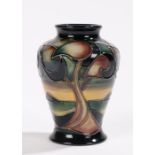 Moorcroft Western Isles pattern vase, the bulbous tapering body with tree decoration, incised and