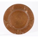 Keswick style Arts and Crafts copper plate, with stylised foliate and scroll decoration, 30.5cm