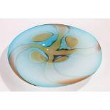 Jusys art glass dish, the blue ground with swirled yellow decoration, etched signature to base, 49cm