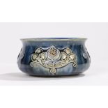 Royal Doulton bowl, the blue ground with raised Art Nouveau foliate decoration, 13cm diameter