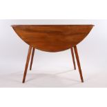 Ercol elm drop leaf dining table, with D shaped leaves, on out splayed tapering chamfered legs,