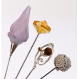 Four vintage hat pins: a Charles Horner silver & citrine hat pin, Chester 1907 a frosted glass