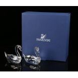 Swarovski swan figures, 7.5cm high, housed in a fitted box with outer box