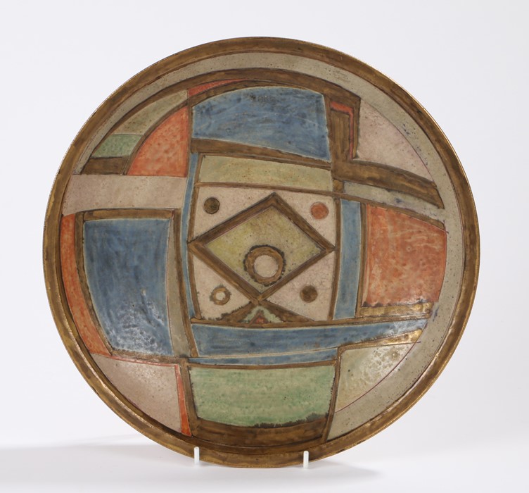 Bernard Forester pottery bowl, the central field decorated with a stylised Moorish mask, 30cm