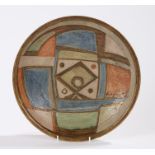 Bernard Forester pottery bowl, the central field decorated with a stylised Moorish mask, 30cm
