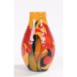 Moorcroft Rydal Mount pattern vase, the tapering body with iris decoration on a yellow ground,
