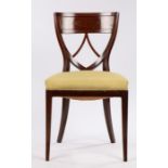 Biedermeier style mahogany occasional chair, the curved cresting rail with brass diamond form
