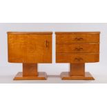 Pair of Art Deco walnut bedside chests, one with three drawers, the other with a cupboard door, on