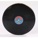 Very rare 1950s novelty compact shaped as a vinyl record (9cm diameter), with a blue record label in