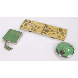 Japanese snakeskin effect compact & cigarette holder, a 1920's Luxor Ltd/Chicago USA green enamelled