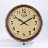 Smiths Sectric Bakelite wall clock, with a signed cream dial and Arabic hours, shaped circular