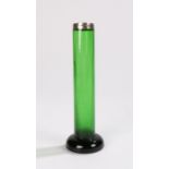 Green glass spill vase, with silver cap, on a domed foot, 14cm high