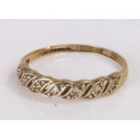 9 carat gold ring, with a wavy stone set head