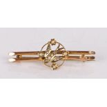 9 carat gold and pearl set brooch, with a bird to the centre and flower surround, 1.9 grams