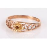 9 carat gold ring, with a flower head design