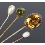 Stick pins, to include a pearl example, a jade example, a citrine example and an opal example, (4)