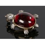 Edwardian garnet and diamond set tortoise brooch, with a cabochon cut garnet back and set