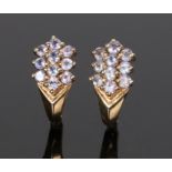 Pair of 10 carat gold amethyst set earrings, each set with ten amethyst to the arch, 16mm long