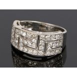 18 carat gold diamond set ring, with a diamond set Greek key design, ring size R