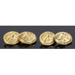 Pair of gold cufflinks, with cherubs to the discs, 20mm high