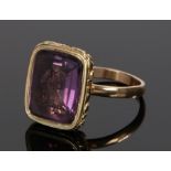 19th Century seal ring, the seal with an intaglio in a purple stone attached to an associated shank,