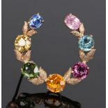 Multi gemstone set brooch, the horse shoe shape brooch set with round and oval gemstones, 30mm