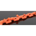 Fine Victorian carved coral bracelet, with a bulls head clasp end and dog carved links, 17cm long,