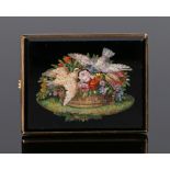 Victorian micro mosaic brooch, with two doves above a basket full of flowers, set to a yellow