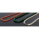 Victorian coral necklace, with a row of coral beads, 100cm long, together with a malachite