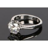 Platinum and diamond solitaire ring, the diamond at 2.06 carat held by six claws to the shank,