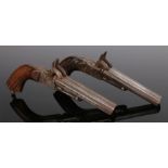 Pair of 19th Century double barrel pocket percussion pistols, octagonal barrels, carved walnut grip,