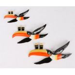 Graduated set of three Carlton Ware Guinness flying toucans, each depicted with two pint glasses