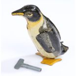 Tin plate clockwork toy, in the form of a penguin, made in Great Britain, 9.5cm high