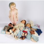 Collection of eight dolls of various sizes and style, together with a quantity of dolls clothes (