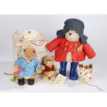 Two Steiff teddy bears, Peter Rabbit and Winnie the Pooh, together with a Hermann model dog and a