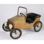 Pedal car, based on a 1938 roadster, with black buttoned leather effect seat