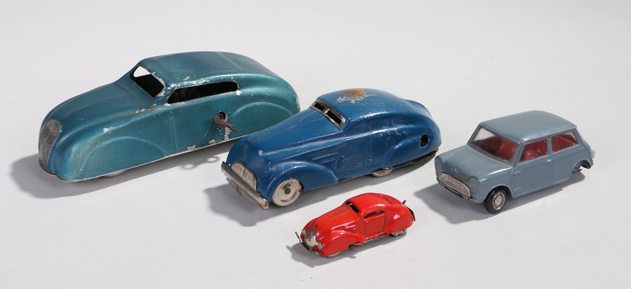 Tin plate cars, to include a Minic example in red, an example in blue, together with an aluminium