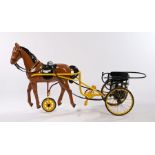 Early 20th century pedal horse and sulky carriage, the chestnut horse with black and yellow