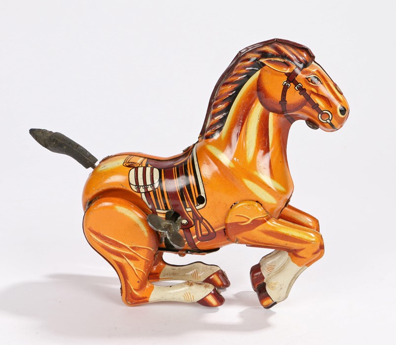 Daiya clockwork tinplate bucking bronco toy