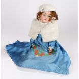 Max Handwerck Germany porcelain doll, with brown hair and closing eyes, wearing a floral embroidered