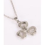 Diamond set bow pendant, on silver with chain