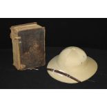The Holt Bible, London George Eyre, 1835, together with a pith helmet, (2)