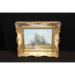 Caesar, landscape scene with gypsy caravan, signed oil on canvas, housed in a gilt frame, the oil