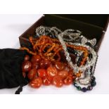 Amber effect necklace, together with an amber bead necklace and other necklaces, (qty)