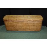 Long wicker ottoman, with a rectangular top with rounded corners above the conforming base, 148cm