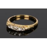 18 carat gold diamond set ring, with five round cut diamonds to the head, ring size P