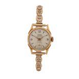 Camy 18 carat gold ladies wristwatch, the signed cream dial with Arabic and triangular numerals,