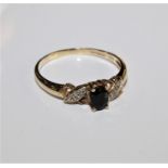 9 carat gold ring, set with a sapphire, ring size S