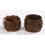 Two Black Forest carved napkin rings, (2)